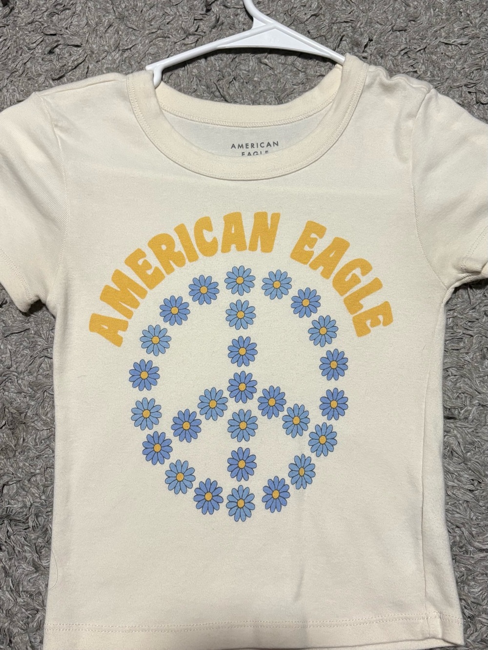 American Eagle Cream Daisy Peace Sign Graphic Baby Tee Size XS